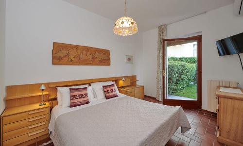 Łóżko lub łóżka w pokoju w obiekcie Apartments Rainer - Front Lake
