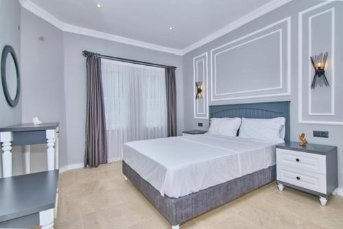Cama ou camas em um quarto em Belinda Apartments