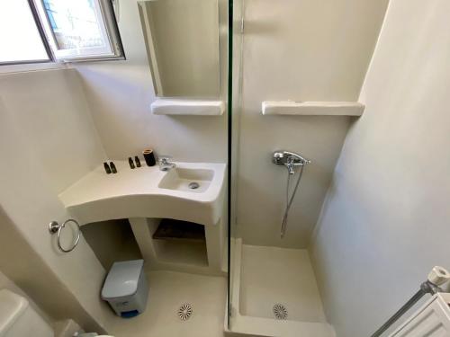 Ванная комната в Pelagias Apartments