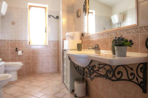 Et badeværelse på Casa I Gerani Vista Mare