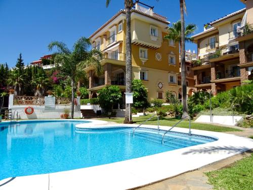 Semidetached Duplex home at Puebla Aida, Mijas Golf with pool, golf and sea views