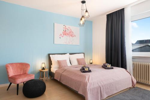 Postel nebo postele na pokoji v ubytování FREE LIVING - Tropical Design Apartments, Zentral, Parkplatz, Küche, Wlan