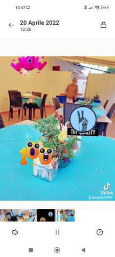 a screenshot of a picture of a table with two toy eyes at IL CONTE DI MARRAONE in Agnone