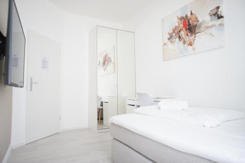 Ένα ή περισσότερα κρεβάτια σε δωμάτιο στο Hotel Böke Rheinfelden