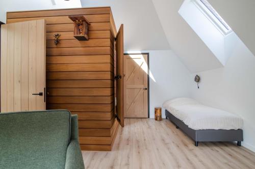 מיטה או מיטות בחדר ב-erve Middendorp