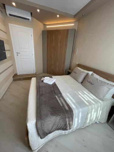 a bedroom with a large bed in a room at Dimora Lucia in Troia