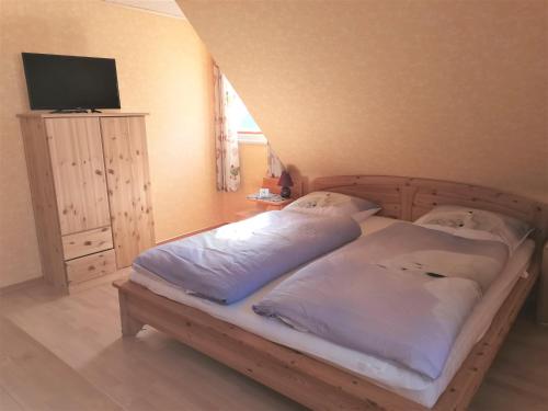 Letto o letti in una camera di Biene's Bärenstube
