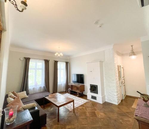 TV a/nebo společenská místnost v ubytování Spacious Supeluse Apartment