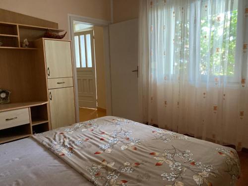 Кровать или кровати в номере Luka Apartment