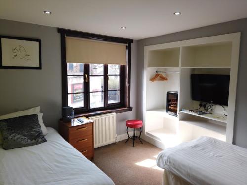 The Orchard Hotelにあるベッド