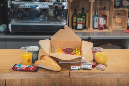 a box of food sitting on top of a table at Apartmán Vila Zuberec in Zuberec