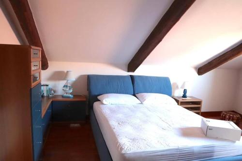 Postel nebo postele na pokoji v ubytování Mansarda Vista Mare