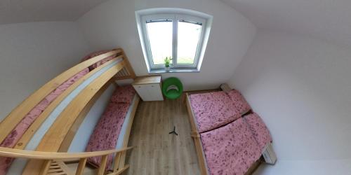 Postel nebo postele na pokoji v ubytování Ubytování Horní Slověnice