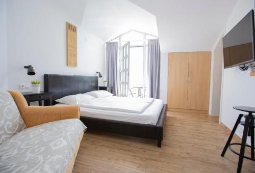 Μια τηλεόραση ή/και κέντρο ψυχαγωγίας στο Guesthouse Seaview