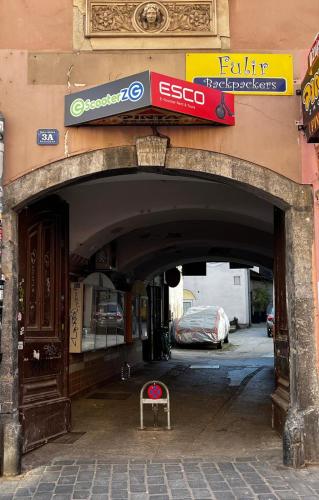 an entrance to a building with a sign on it at Apartments Top Center in Zagreb