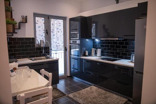 Kuchyň nebo kuchyňský kout v ubytování Sophia’s place