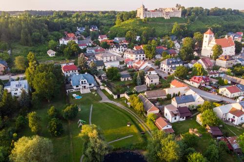 an aerial view of a small town with a castle at Dwór Meluzyna in Janowiec
