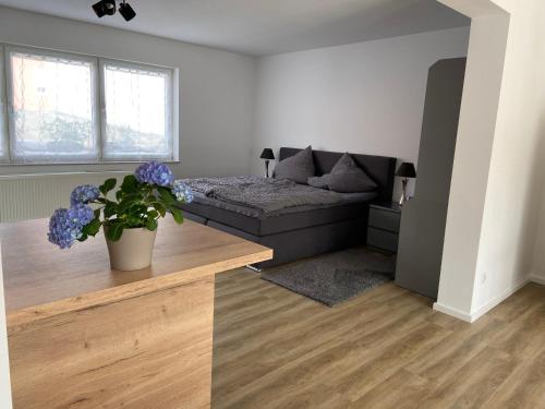 a living room with a couch and a table at Weinquartier Kröv in Kröv