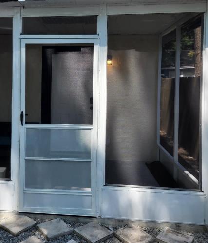 a front door of a house with glass at STUDIO 4A in Lakeland