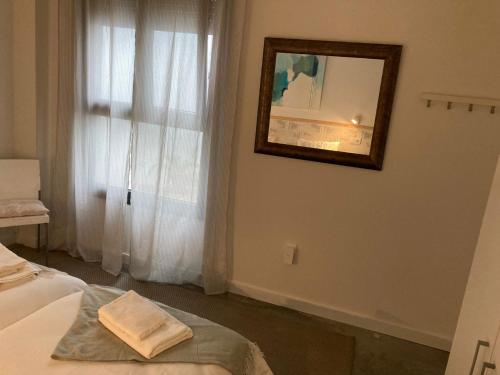 Acogedor apartamento en semisótano con patio y cerca de la Plaza de España