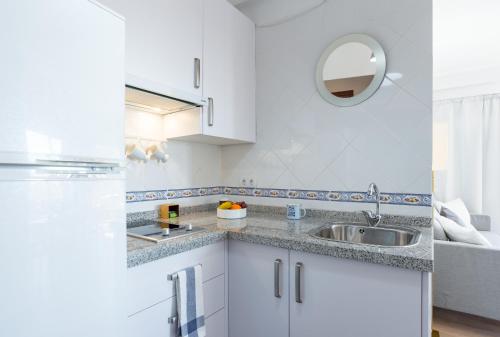 A kitchen or kitchenette at Soho Centro Terrace 2 Rooms Young People Only