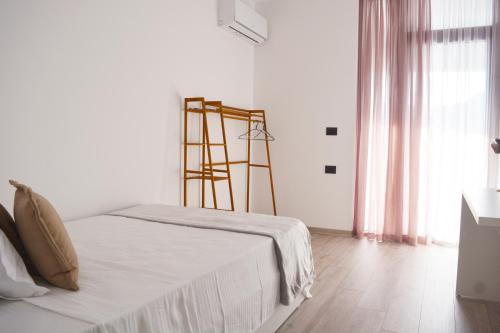 سرير أو أسرّة في غرفة في By the Sea 3 - Luxurious Residence