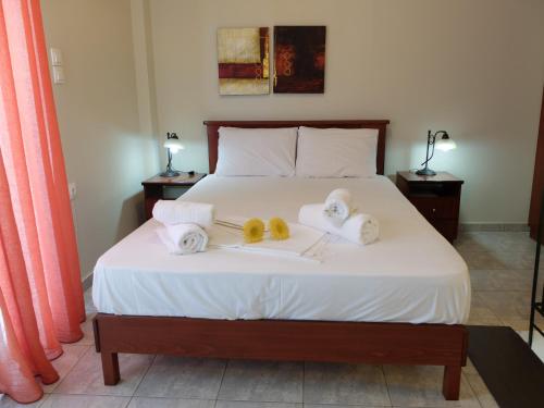 Postel nebo postele na pokoji v ubytování Villa Sofia Fanari