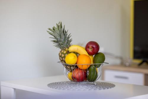 a bowl of fruit sitting on top of a counter at Apartmani San Martin in Sveti Martin na Muri