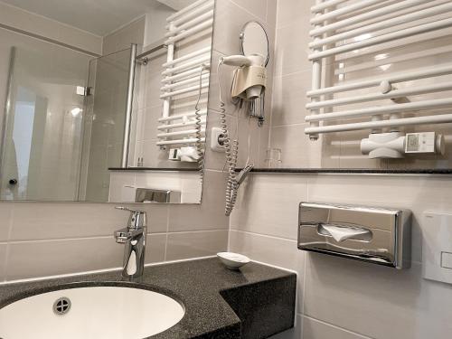 Koupelna v ubytování Hotel Schnehagen