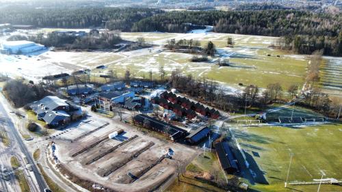 an aerial view of a building in a park at Rocklunda Village in Västerås