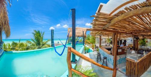 a water slide at a resort on the beach at Hotel Villas Tiburon Adults Only in Holbox Island