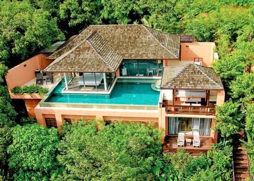 an aerial view of a house with a swimming pool at Sri Panwa Phuket Luxury Pool Villa Hotel - SHA Plus in Panwa Beach