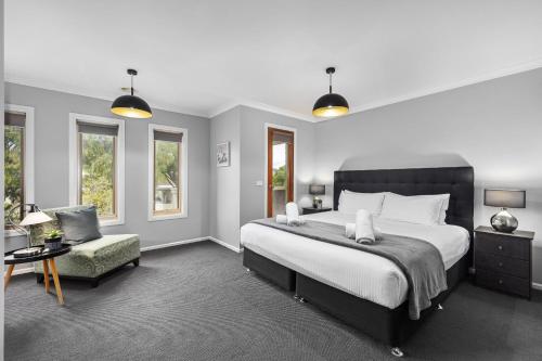 Ένα ή περισσότερα κρεβάτια σε δωμάτιο στο Luxury Coastal Escape