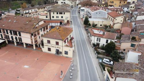 an overhead view of a city street with buildings at Albergo Casa Al Sole in Greve in Chianti