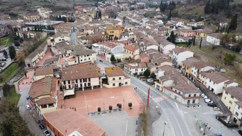 an aerial view of a town with a street and buildings at Albergo Casa Al Sole in Greve in Chianti