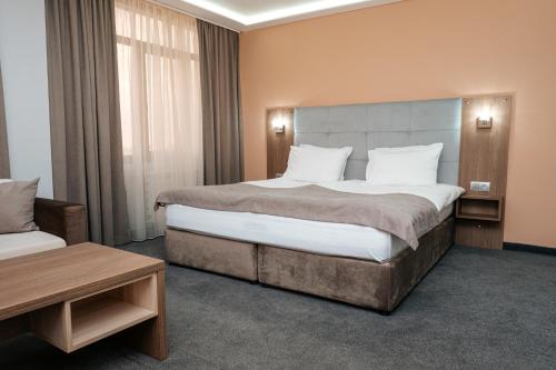En eller flere senger på et rom på Hotel Tundzha - Renovated!