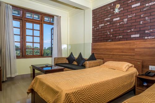 Postel nebo postele na pokoji v ubytování Apsara Guest House