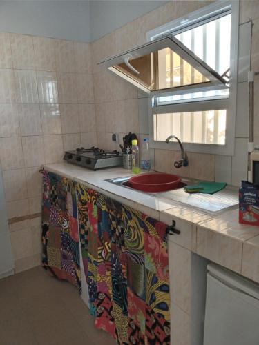 Η κουζίνα ή μικρή κουζίνα στο chambre studio