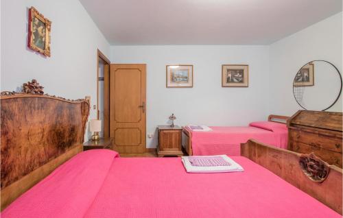 Ένα ή περισσότερα κρεβάτια σε δωμάτιο στο Casa Del Gelsomino