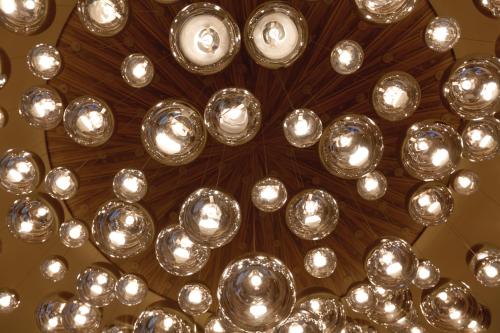 a bunch of balls hanging from a ceiling at Radisson Hotel & Conference Centre Calgary Airport in Calgary