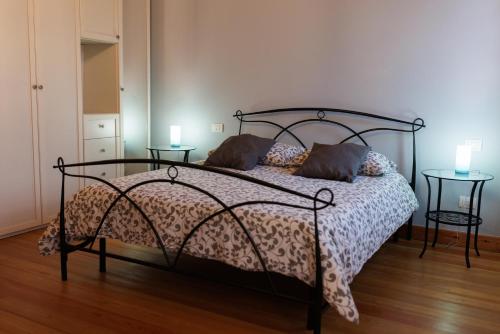 Postel nebo postele na pokoji v ubytování Manfredi B&B