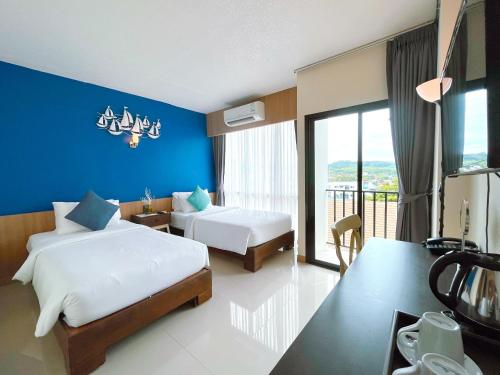 Imagem da galeria de The Sixteenth Naiyang Beach Hotel SHA Plus em Nai Yang Beach