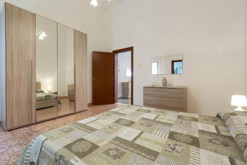 Ένα ή περισσότερα κρεβάτια σε δωμάτιο στο Casa Di Luana by BarbarHouse