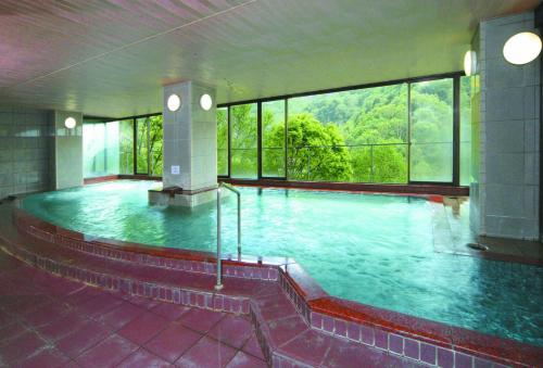 Bazén v ubytování Shiga Kogen Hotel Shiga Sunvalley nebo v jeho okolí