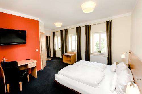 Postel nebo postele na pokoji v ubytování Das Hotel by Ferber