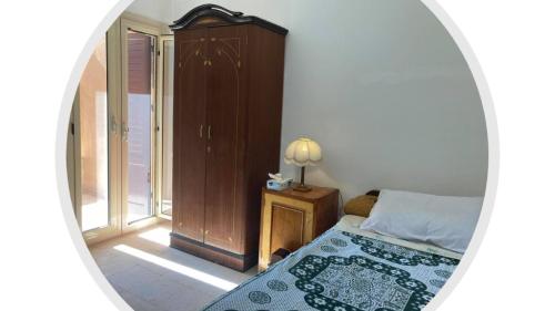 Ένα ή περισσότερα κρεβάτια σε δωμάτιο στο Location Maison en bord de mer, Nord Egypte