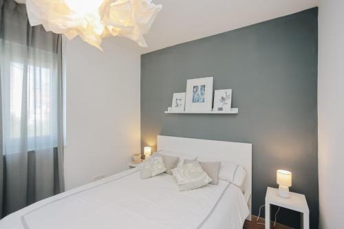 Ένα ή περισσότερα κρεβάτια σε δωμάτιο στο Apartman Tema