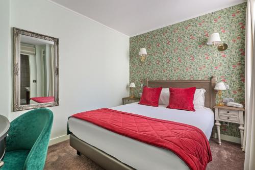 Ένα ή περισσότερα κρεβάτια σε δωμάτιο στο Hôtel de Sèvres