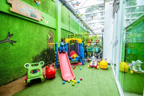 a childrens play area with toys in a store at Grand Tjokro Yogyakarta in Yogyakarta