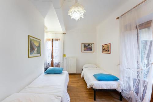 Posteľ alebo postele v izbe v ubytovaní Del Corso Apartment